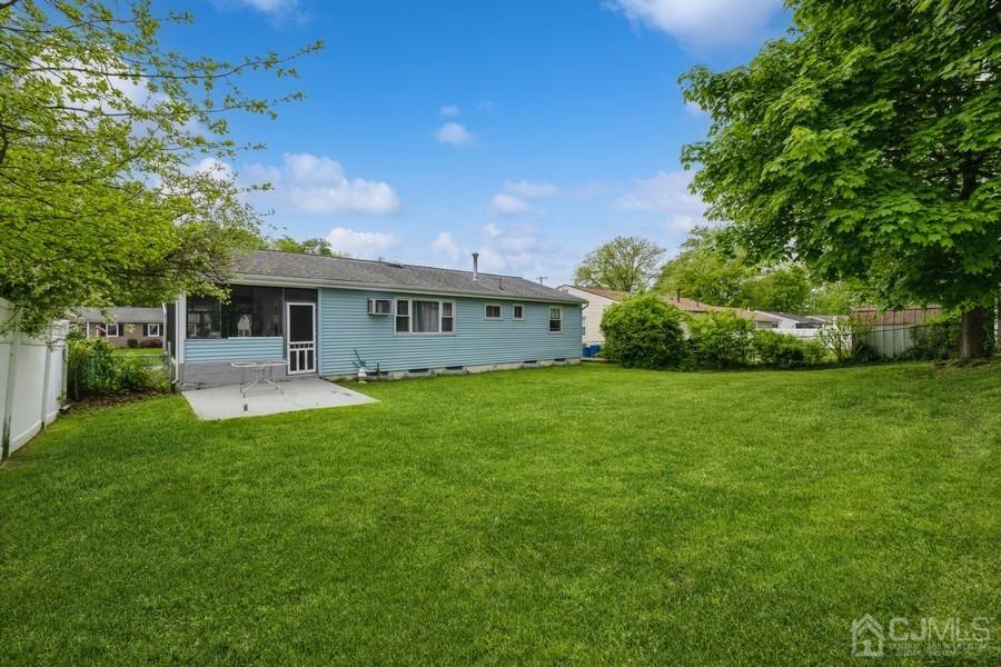 197 Princeton Road Old Bridge, NJ 08859 - Photo 22 of 25 a view of a house with a backyard