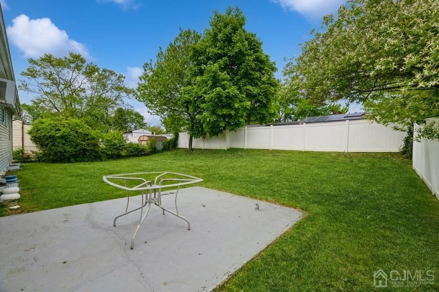 197 Princeton Road Old Bridge, NJ 08859 - Photo 24 of 25 a view of a house with backyard and a sitting area