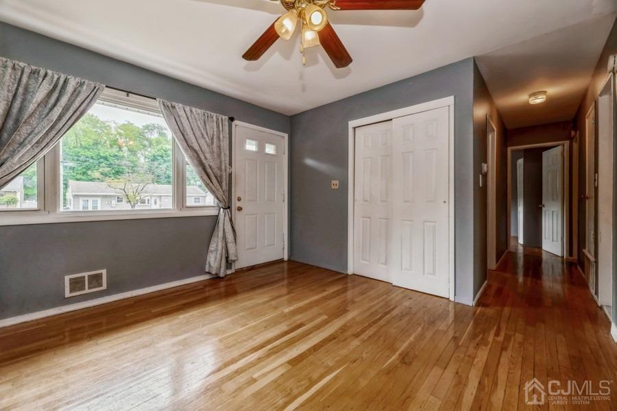 197 Princeton Road Old Bridge, NJ 08859 - Photo 3 of 25 a view of entryway with wooden floor and door