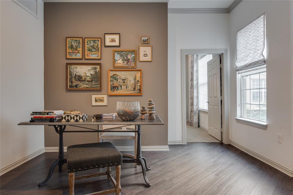 4201 Lomo Alto Drive, Unit 216 Highland Park, TX 75219 - Photo 9 of 31 a view of a workspace with furniture and a window