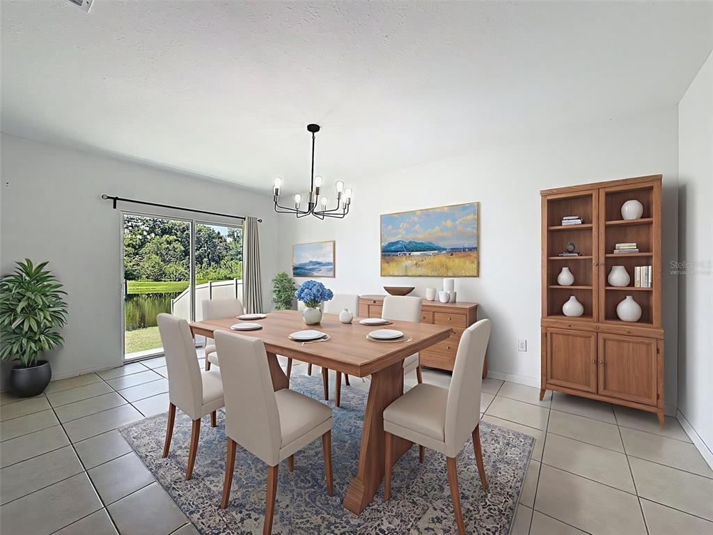 4395 Trotters Way Lakeland, FL 33801 - Photo 14 of 67 a view of a dining room with furniture window and wooden floor