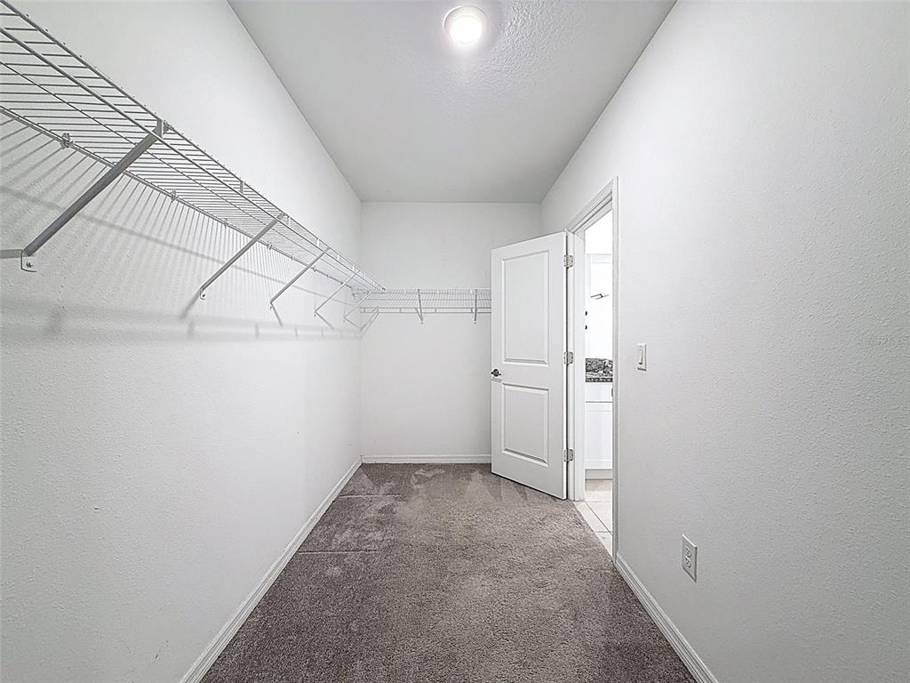 4395 Trotters Way Lakeland, FL 33801 - Photo 21 of 67 wooden floor in an empty room