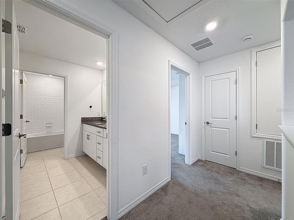 4395 Trotters Way Lakeland, FL 33801 - Photo 45 of 67 wooden floor and closet in a room