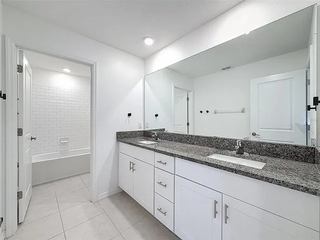 a view of a lake with a swimming pool