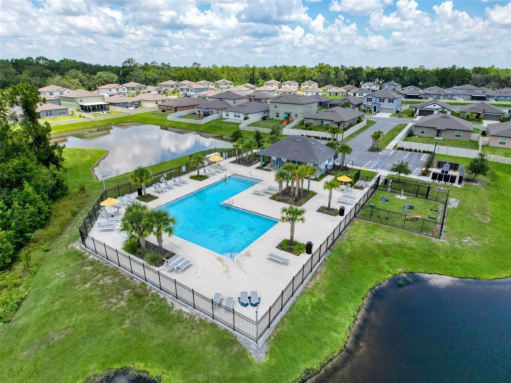 4395 Trotters Way Lakeland, FL 33801 - Photo 64 of 67 an aerial view of residential houses with outdoor space and parking