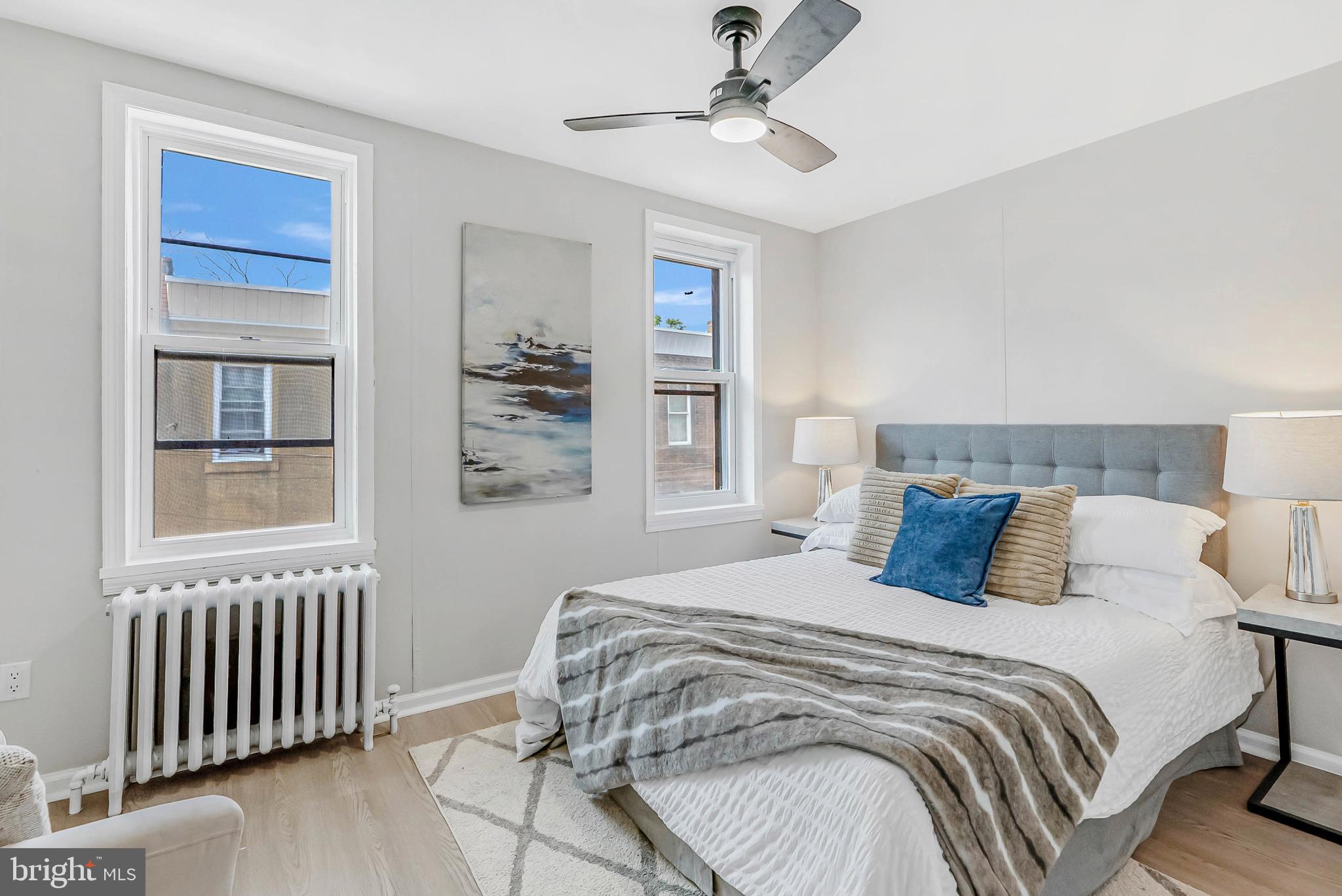 2839 Winton Street Philadelphia, PA 19145 - Photo 11 of 20 a bedroom with a large bed and a window