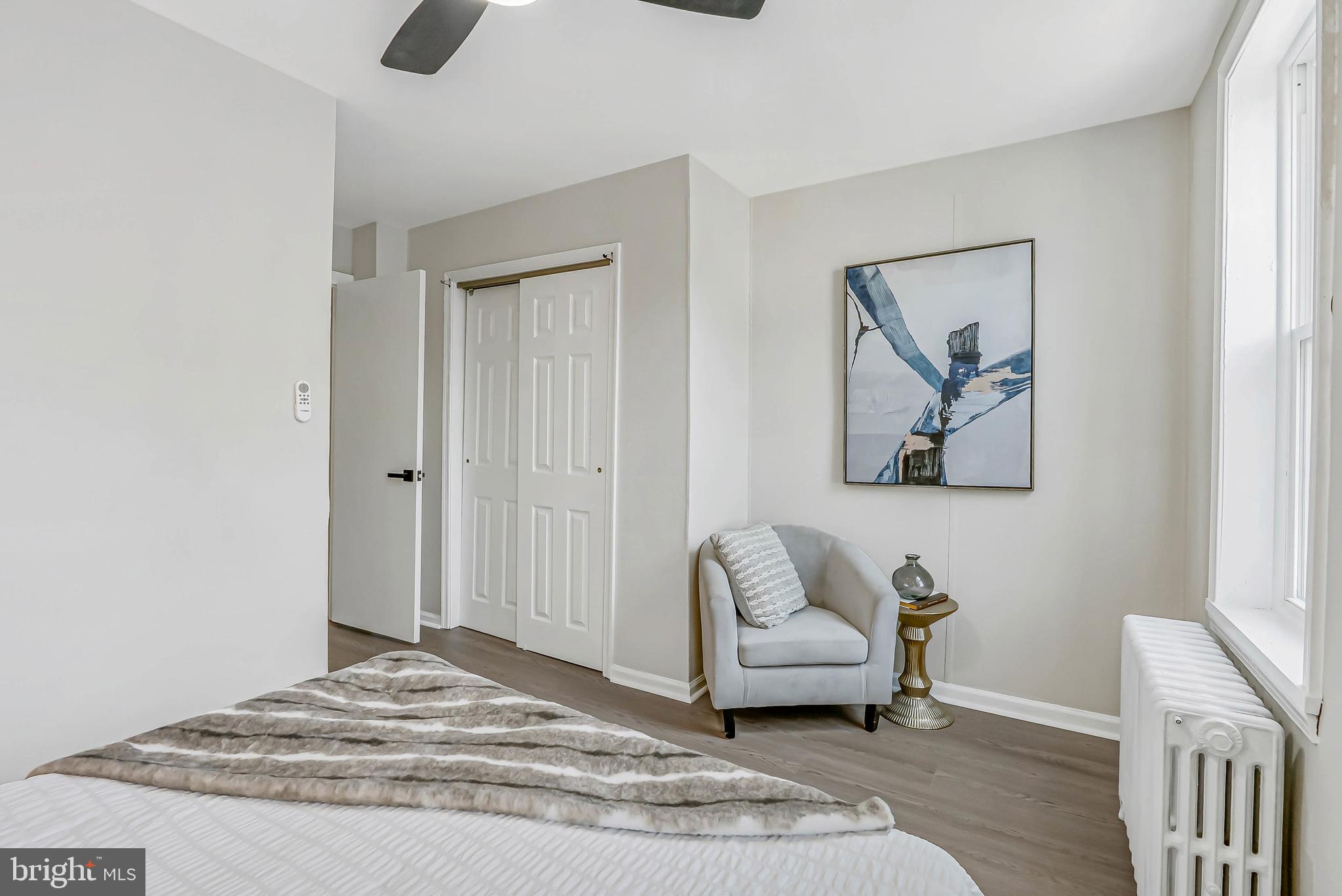 2839 Winton Street Philadelphia, PA 19145 - Photo 12 of 20 a living room with furniture and a window