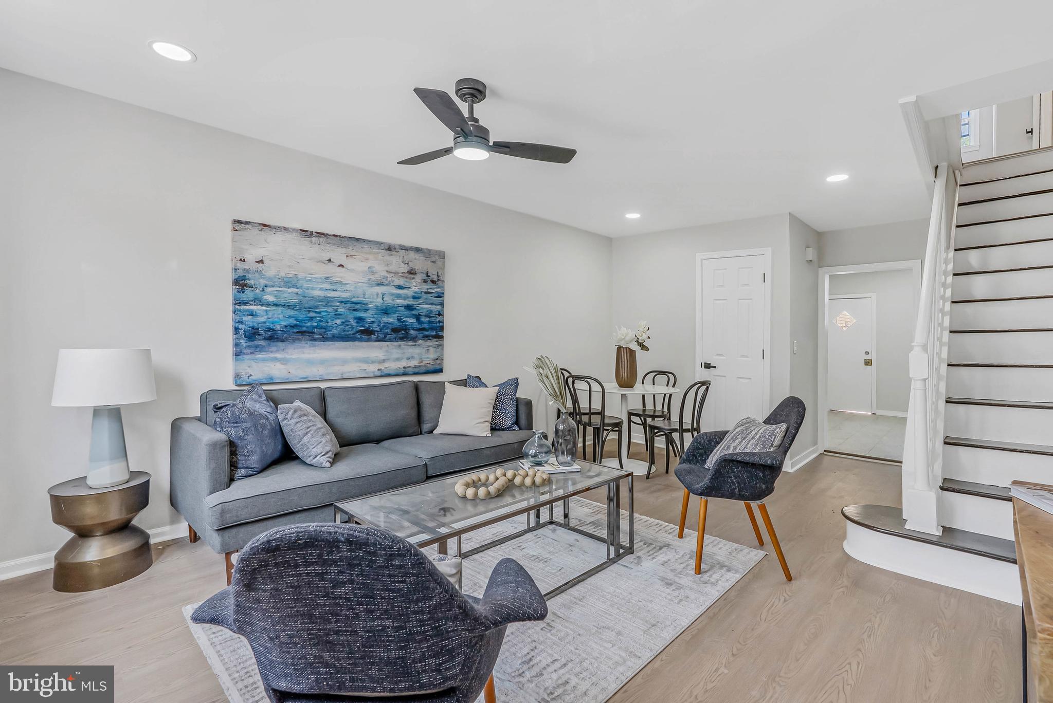 2839 Winton Street Philadelphia, PA 19145 - Photo 2 of 20 a living room with furniture and a lamp