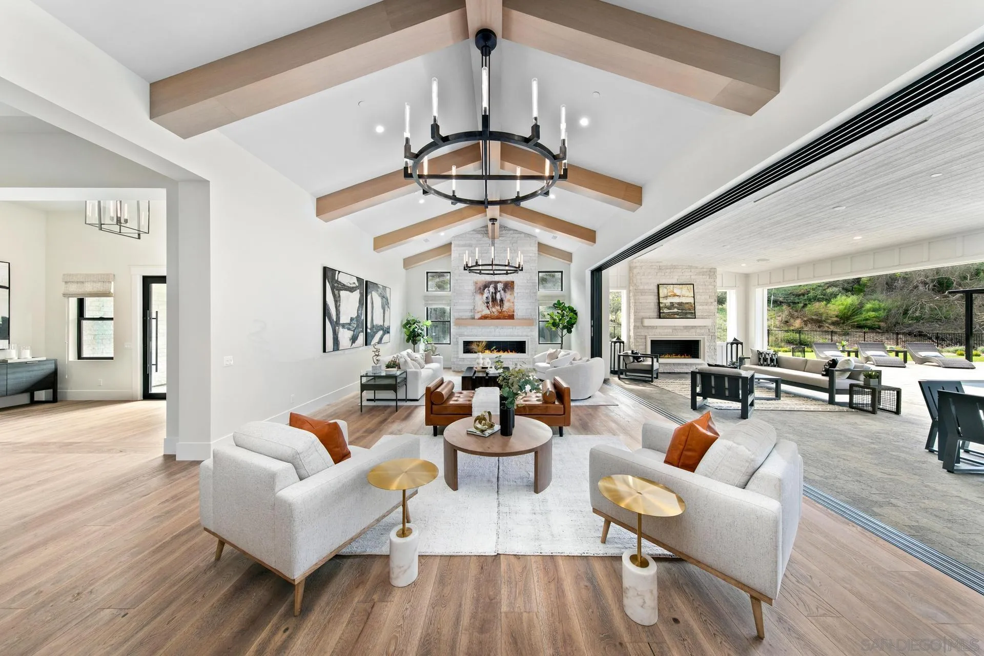 16073 Via Monte Rancho Santa Fe, CA 92067 - Photo 15 of 62 a living room with fireplace furniture and a chandelier