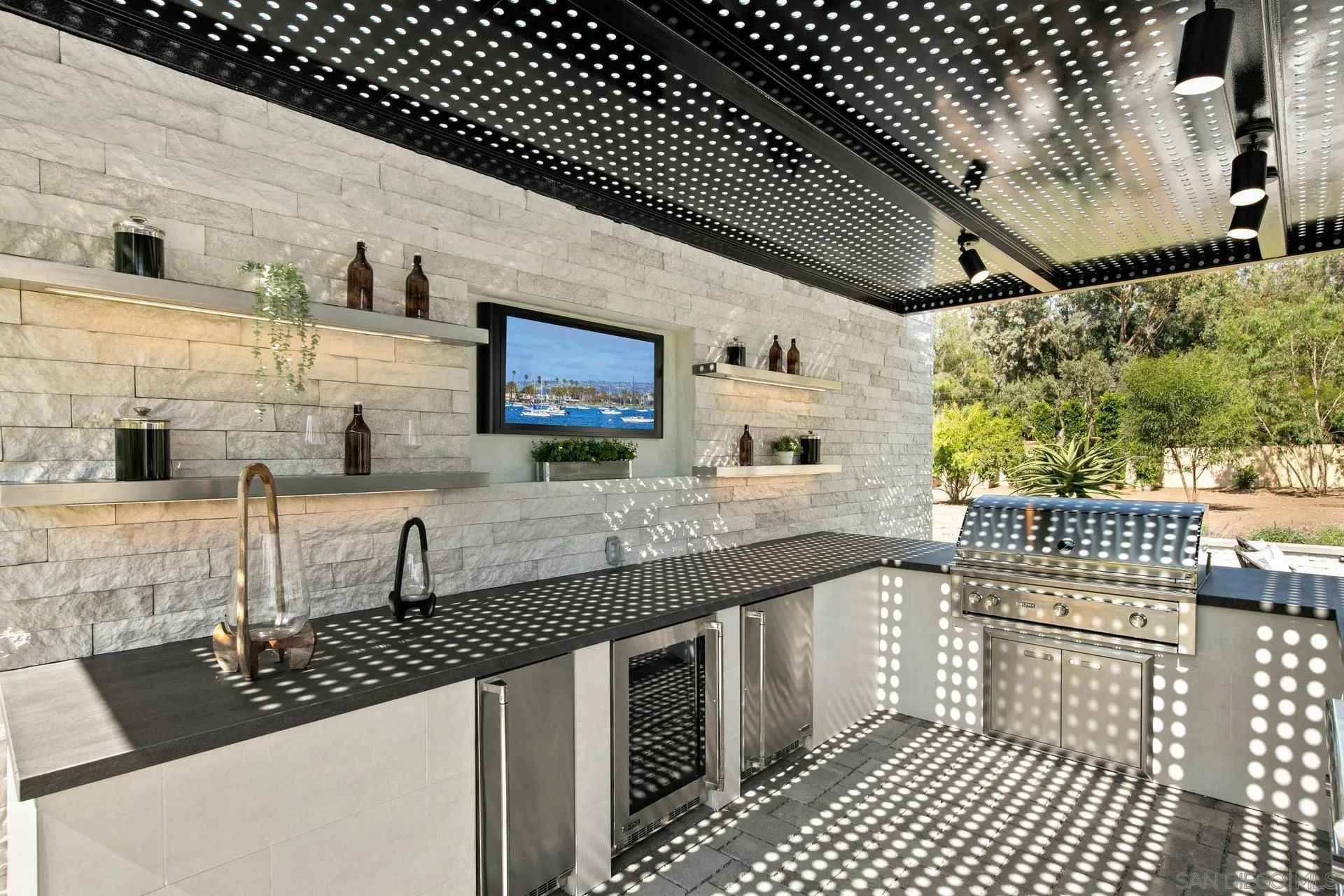 16073 Via Monte Rancho Santa Fe, CA 92067 - Photo 35 of 62 a kitchen with stainless steel appliances granite countertop a sink and cabinets