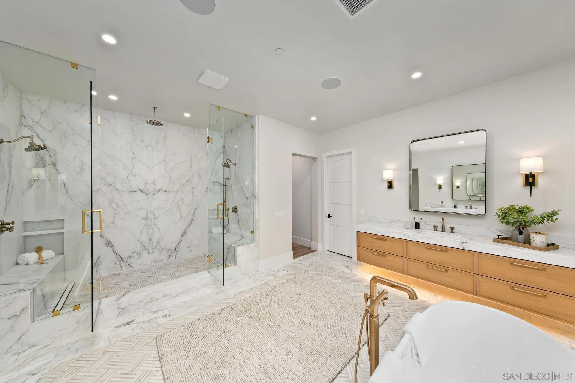 16073 Via Monte Rancho Santa Fe, CA 92067 - Photo 45 of 62 a large bathroom with a tub sink shower and mirror