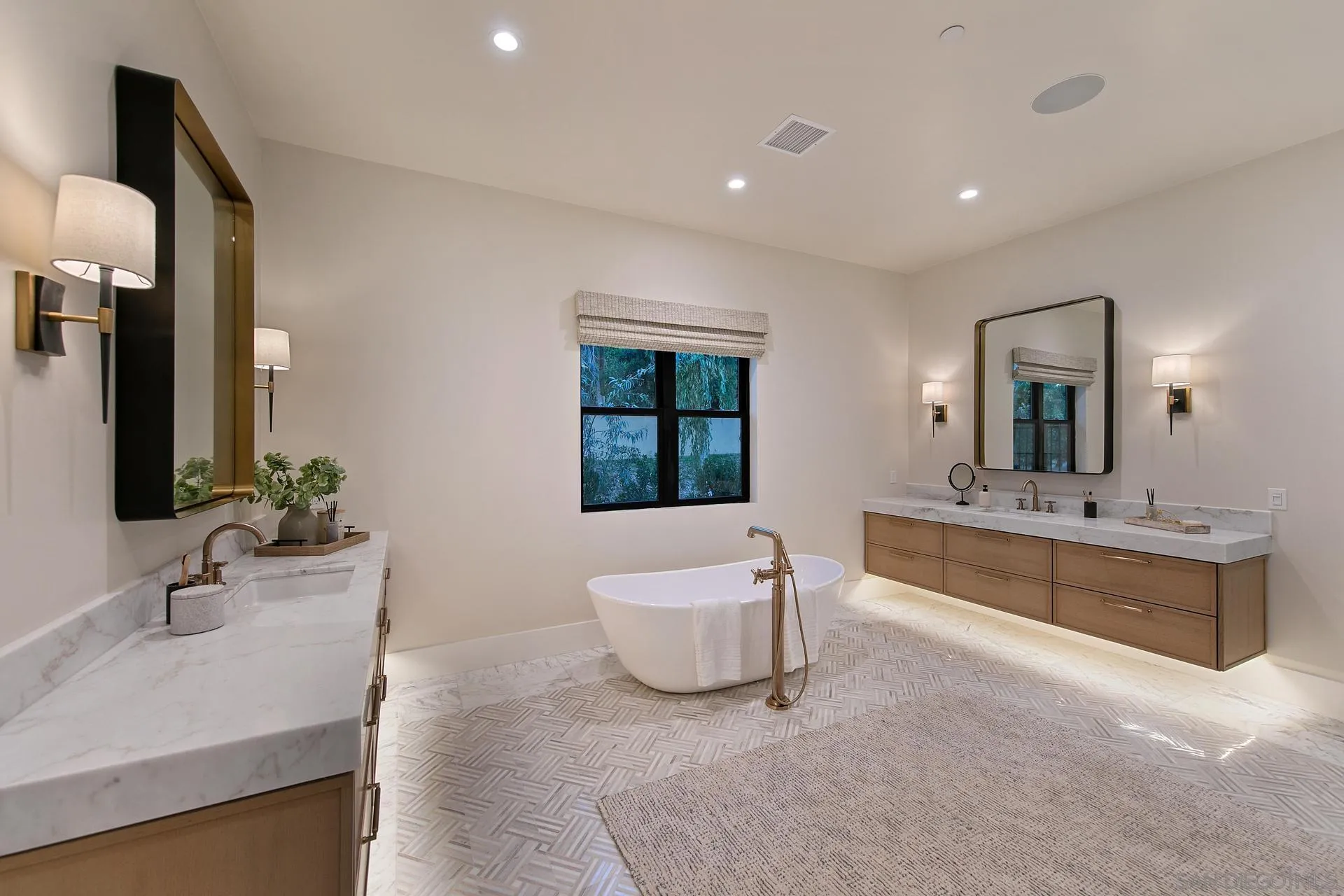 16073 Via Monte Rancho Santa Fe, CA 92067 - Photo 47 of 62 a bathroom with a double vanity sink a bathtub and mirror