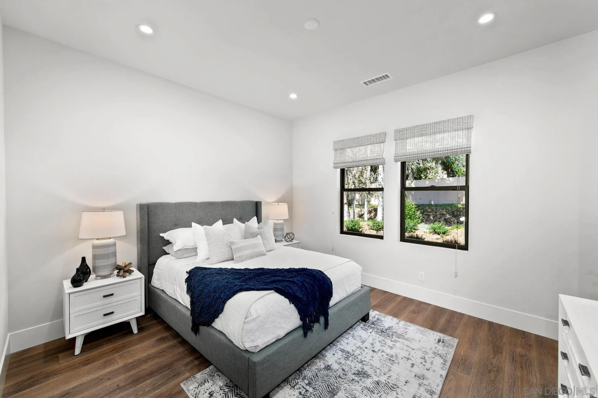 16073 Via Monte Rancho Santa Fe, CA 92067 - Photo 49 of 62 a bedroom with a bed and a window