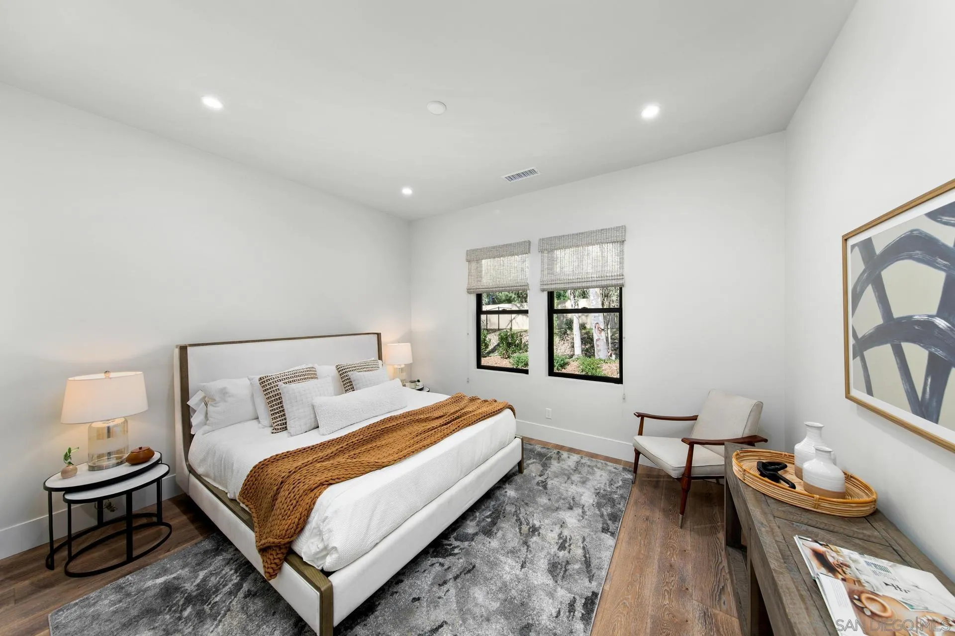 16073 Via Monte Rancho Santa Fe, CA 92067 - Photo 51 of 62 a bedroom with a bed and wooden floor