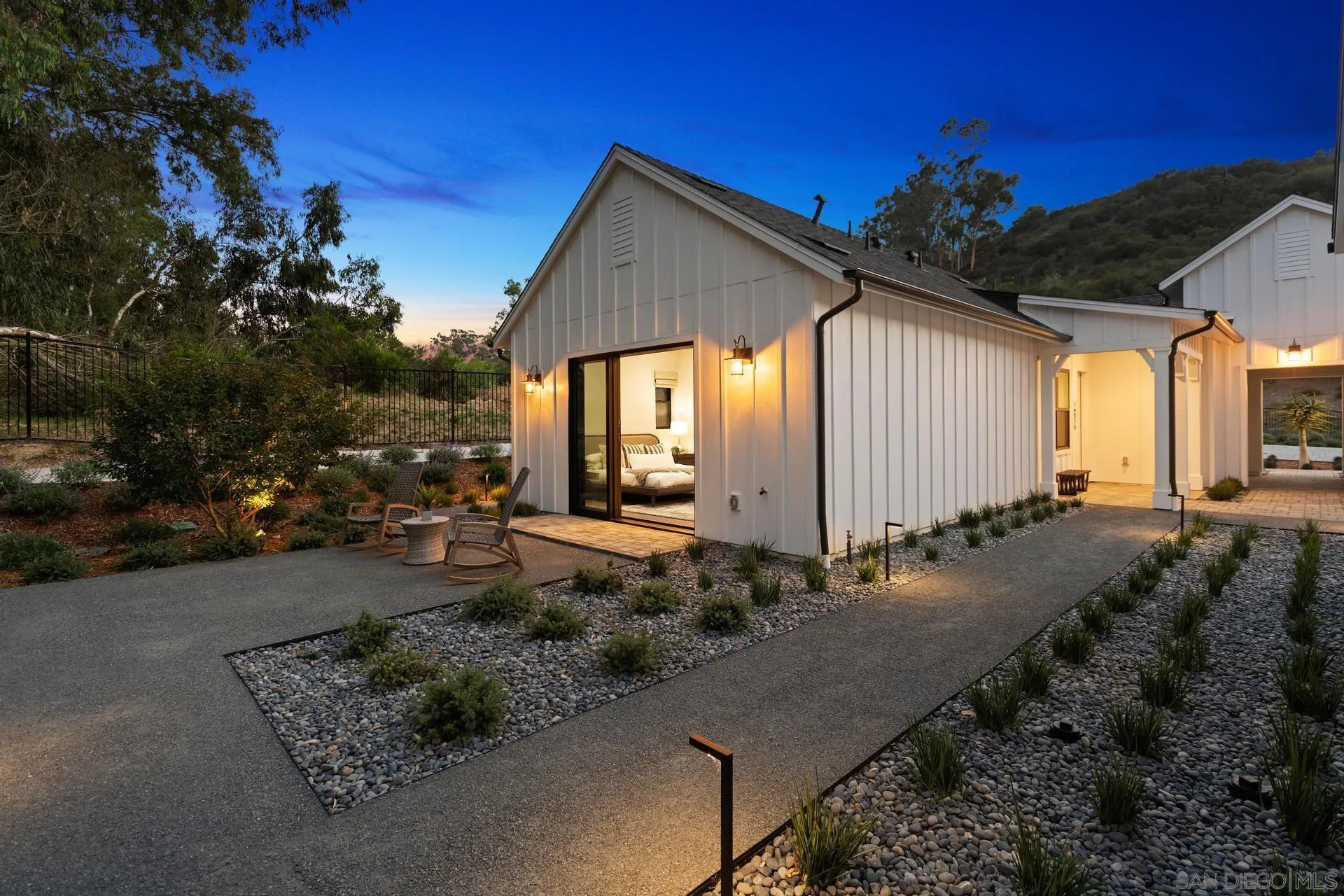 16073 Via Monte Rancho Santa Fe, CA 92067 - Photo 58 of 62 a front view of a house with garden