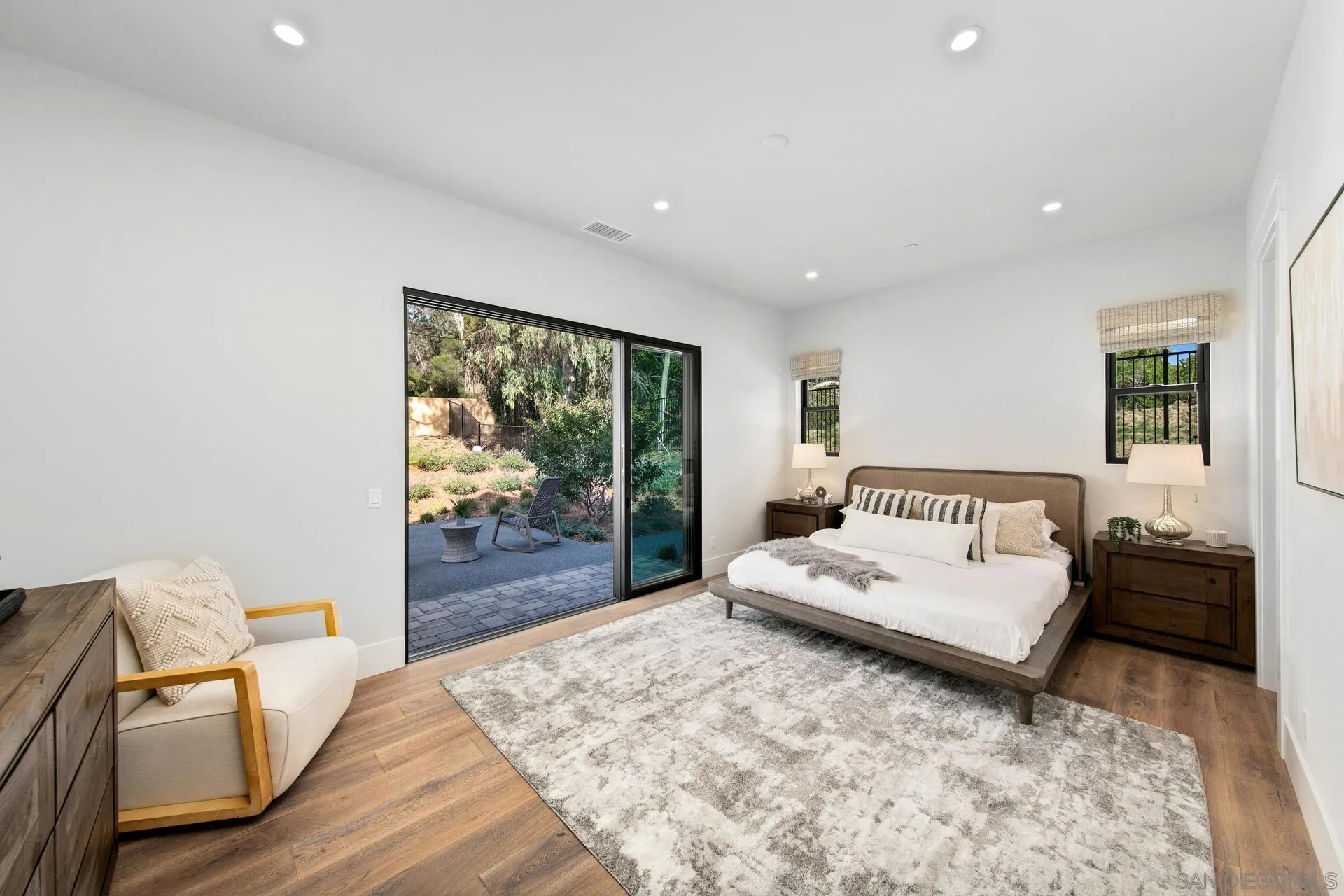 16073 Via Monte Rancho Santa Fe, CA 92067 - Photo 60 of 62 a bedroom with a large bed and a view of bedroom