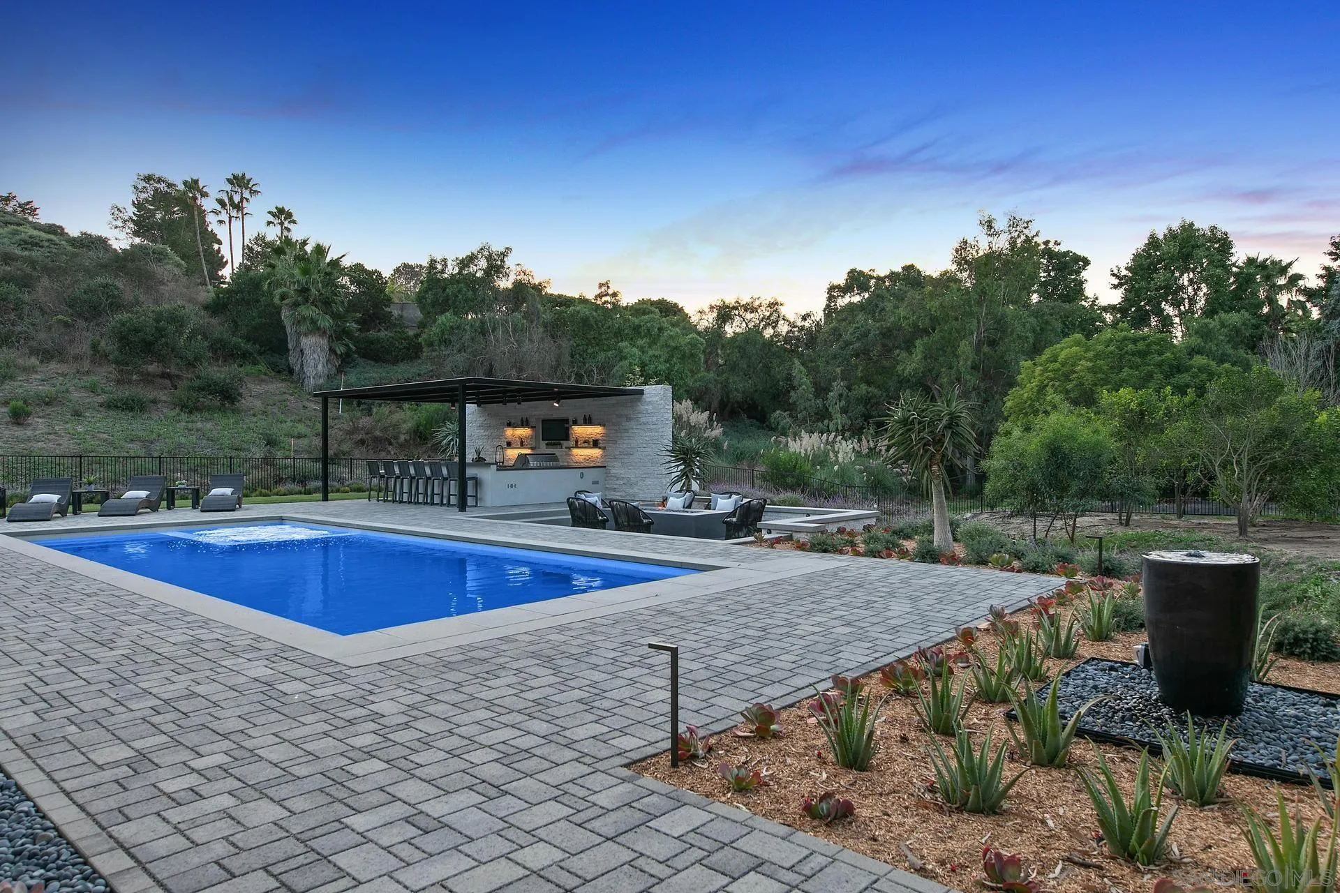 16073 Via Monte Rancho Santa Fe, CA 92067 - Photo 7 of 62 a view of a swimming pool with a patio