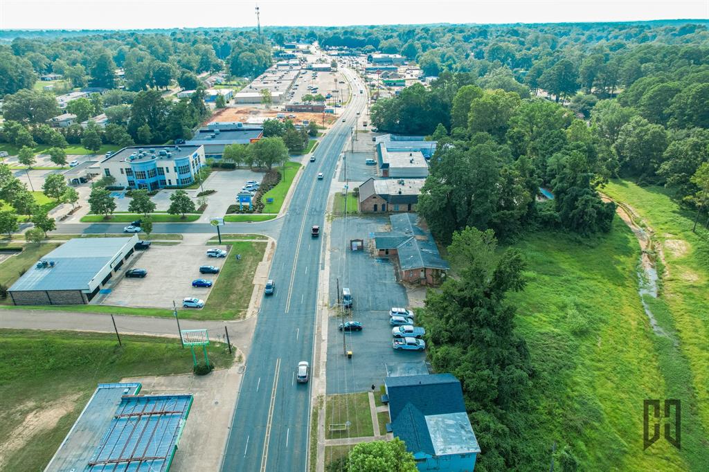 435 Homer Road Minden, LA 71055 - Photo 7 of 16 an aerial view of residential houses with outdoor space and trees