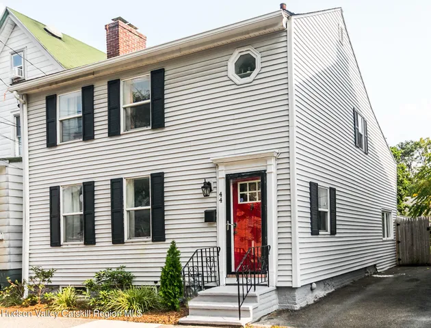 a view of a house with a white door