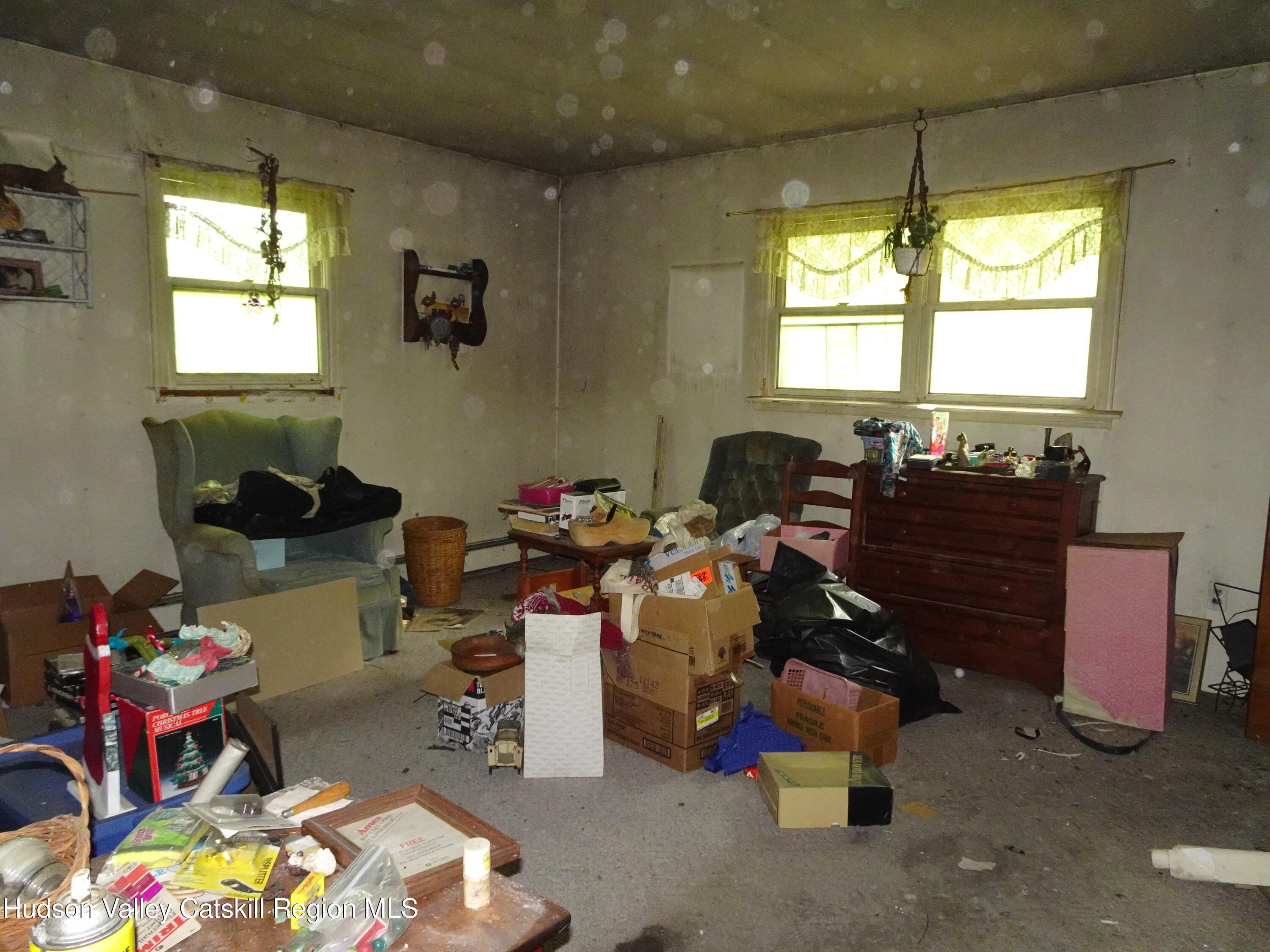 7 Old County Rte 27 Craryville, NY 12521 - Photo 19 of 39 a room with gym equipment and a window