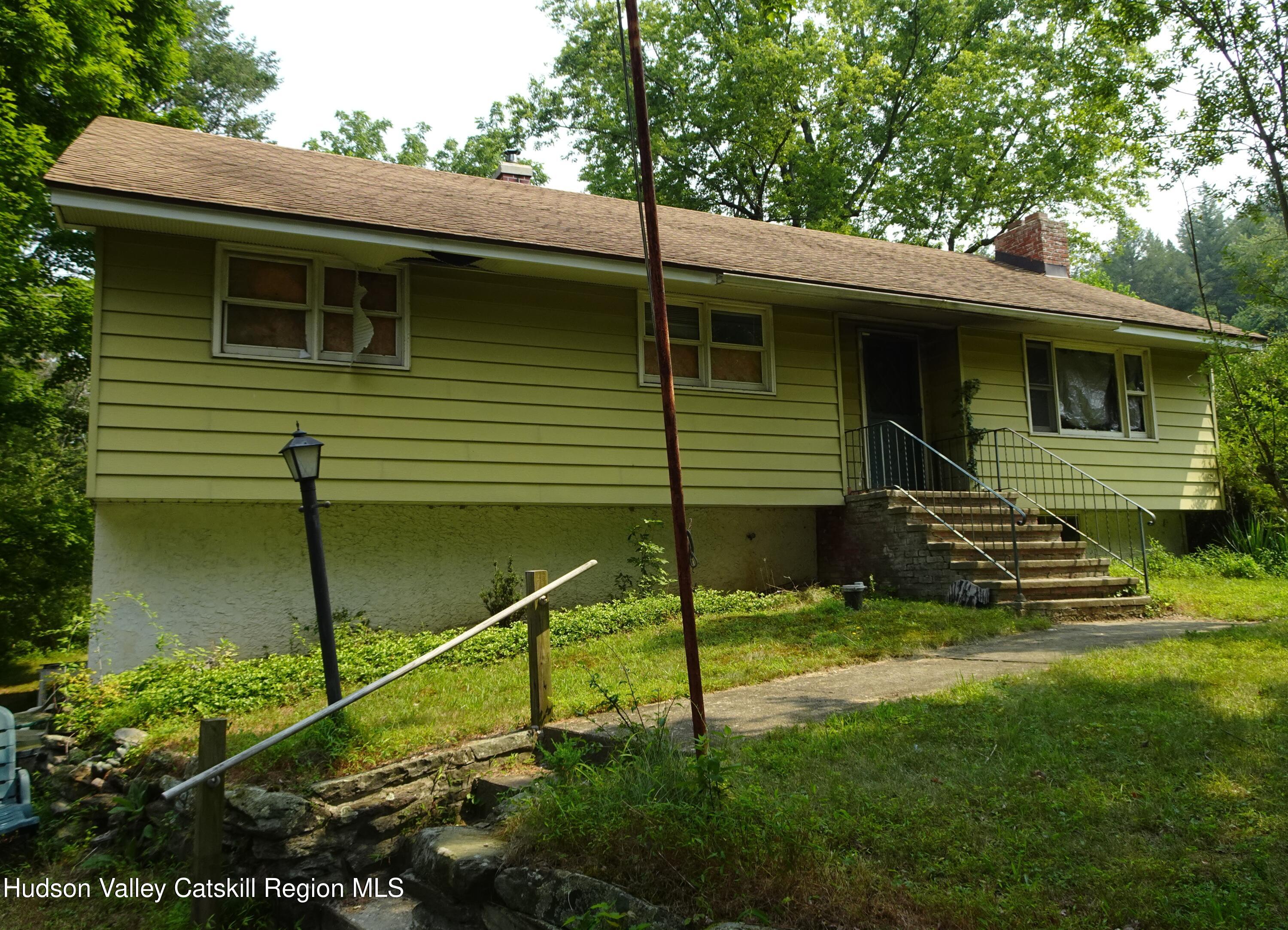 7 Old County Rte 27 Craryville, NY 12521 - Photo 2 of 39 a backyard of a house with lots of green space