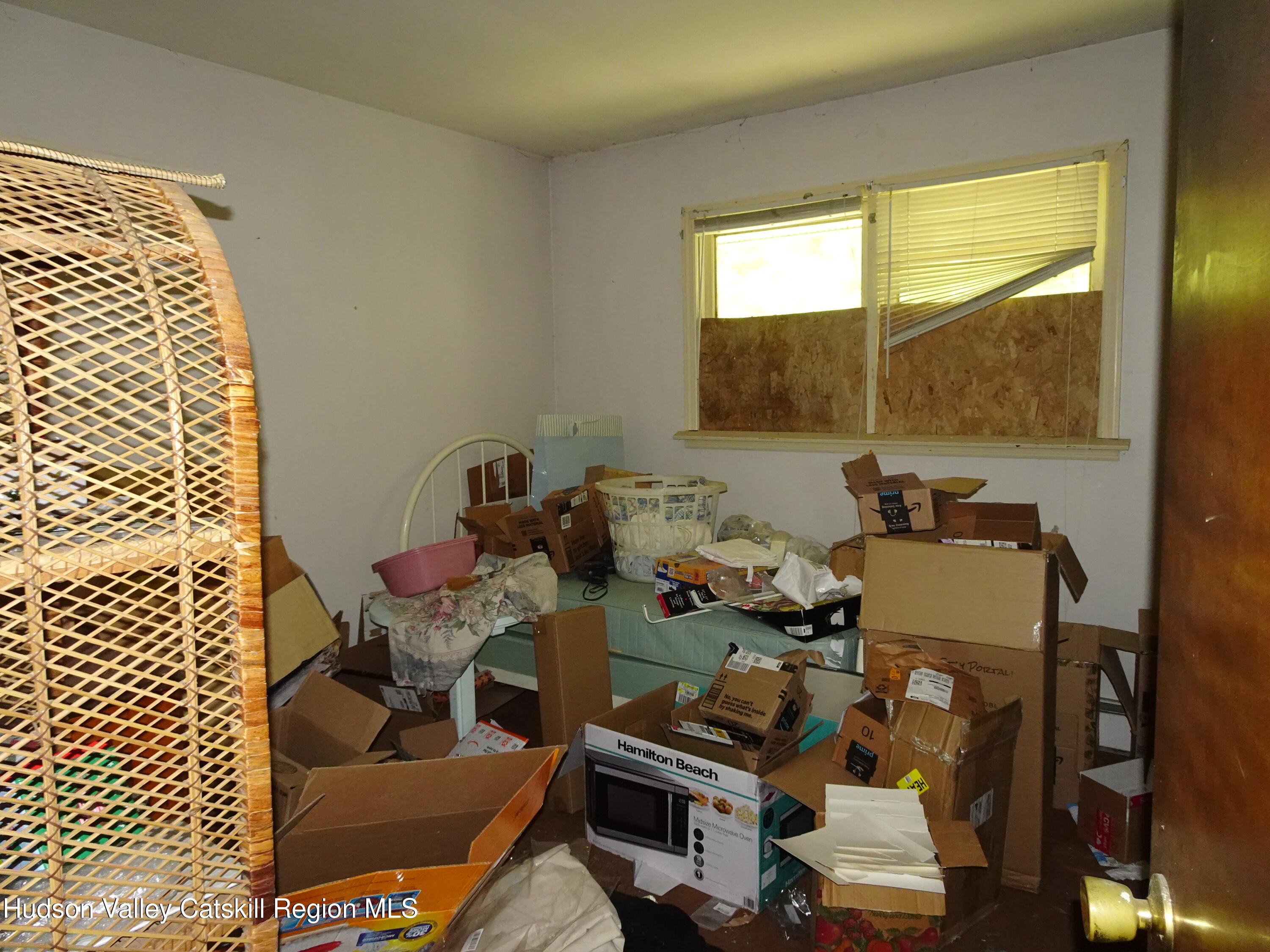 7 Old County Rte 27 Craryville, NY 12521 - Photo 22 of 39 a room with furniture and a window