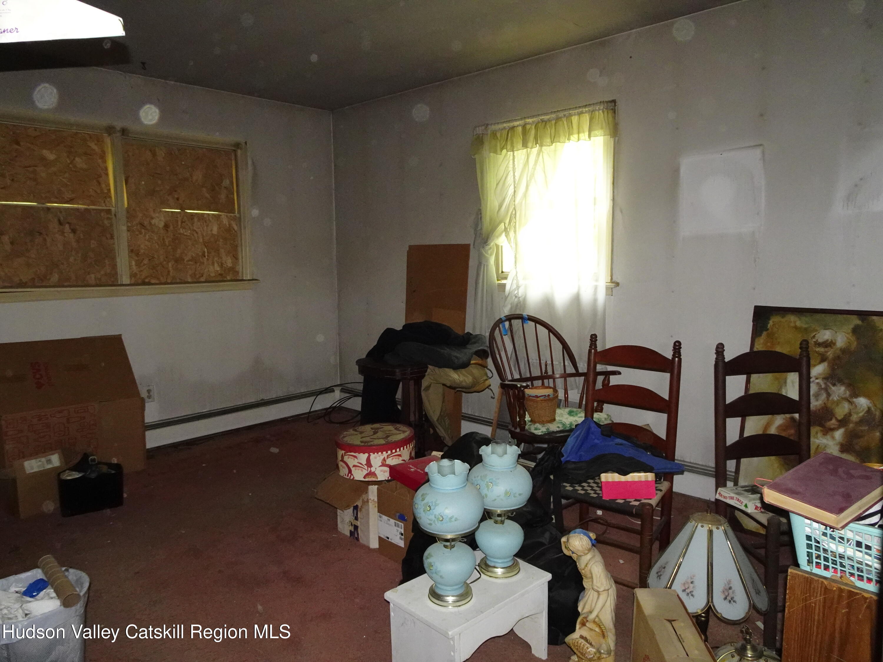 7 Old County Rte 27 Craryville, NY 12521 - Photo 24 of 39 a living room with furniture a rug and a window