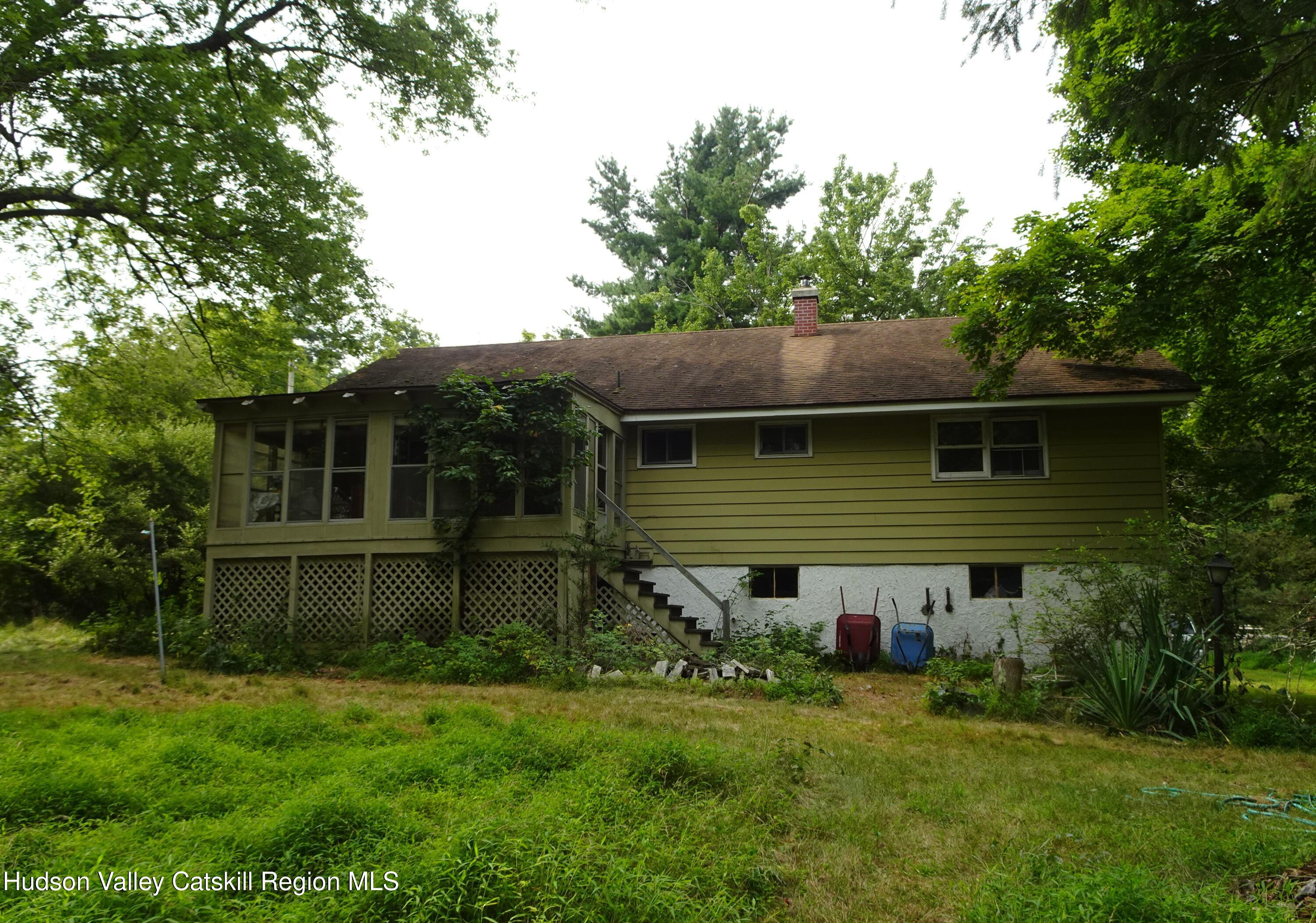 7 Old County Rte 27 Craryville, NY 12521 - Photo 6 of 39 a house that has a backyard