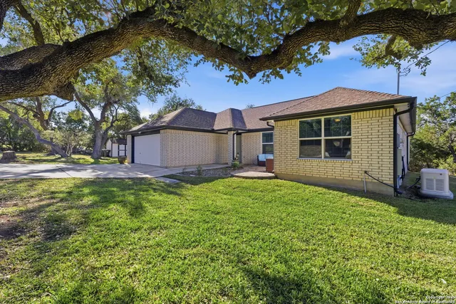 a house view with a garden space