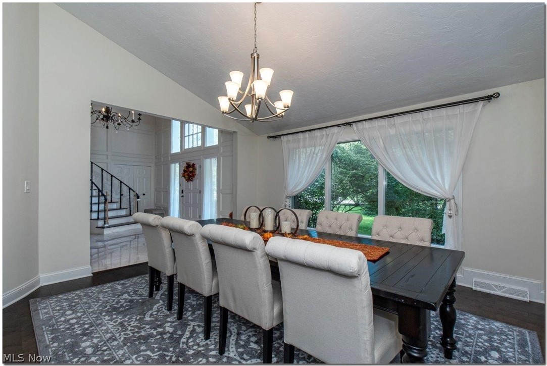 3200 Lander Road Pepper Pike, OH 44124 - Photo 7 of 35 Large formal dining room with vaulted ceiling and pass-through with additional Breakfast Bar/Buffet