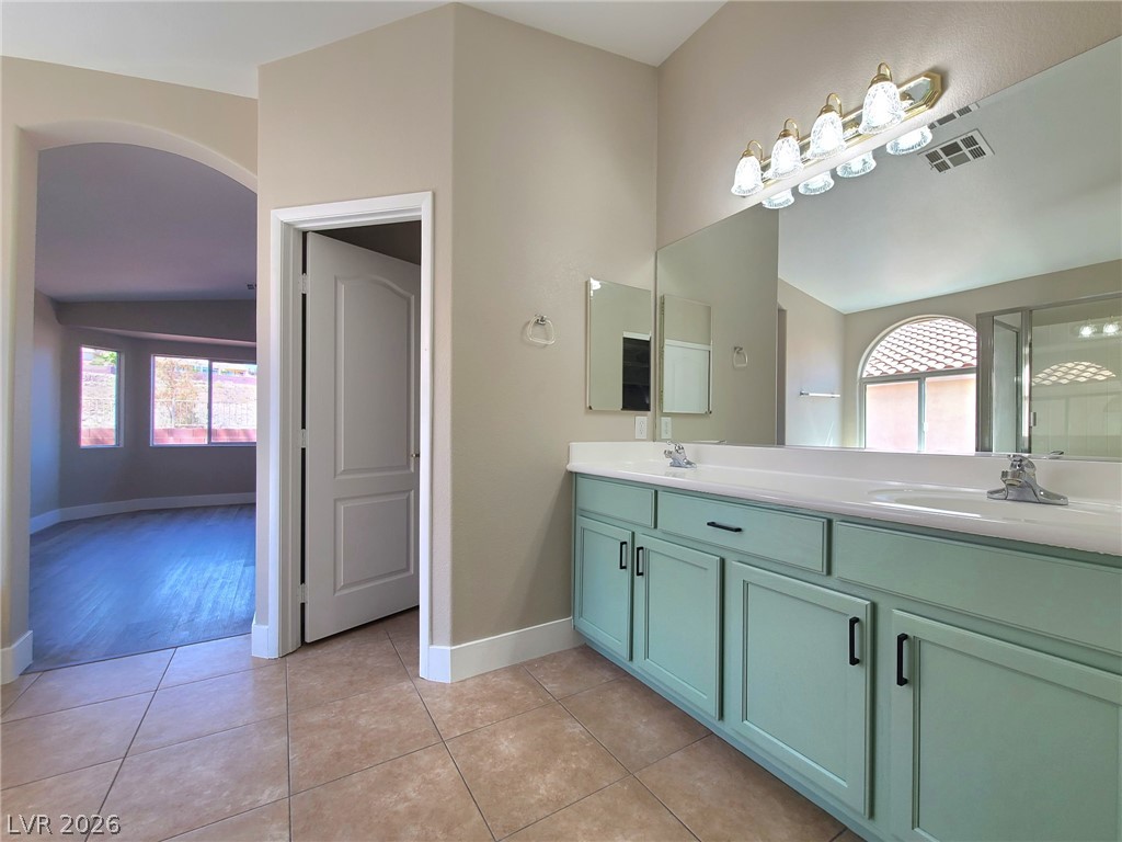 2278 Chestnut Ranch Avenue Henderson, NV 89052 - Photo 10 of 18 Double vanity with ample counter space creates a functional and inviting bathroom retreat.