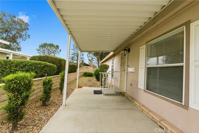 a view of bushes and pathway