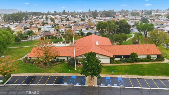 a view of a swimming pool with seating area