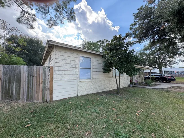 a view of a backyard with a garden