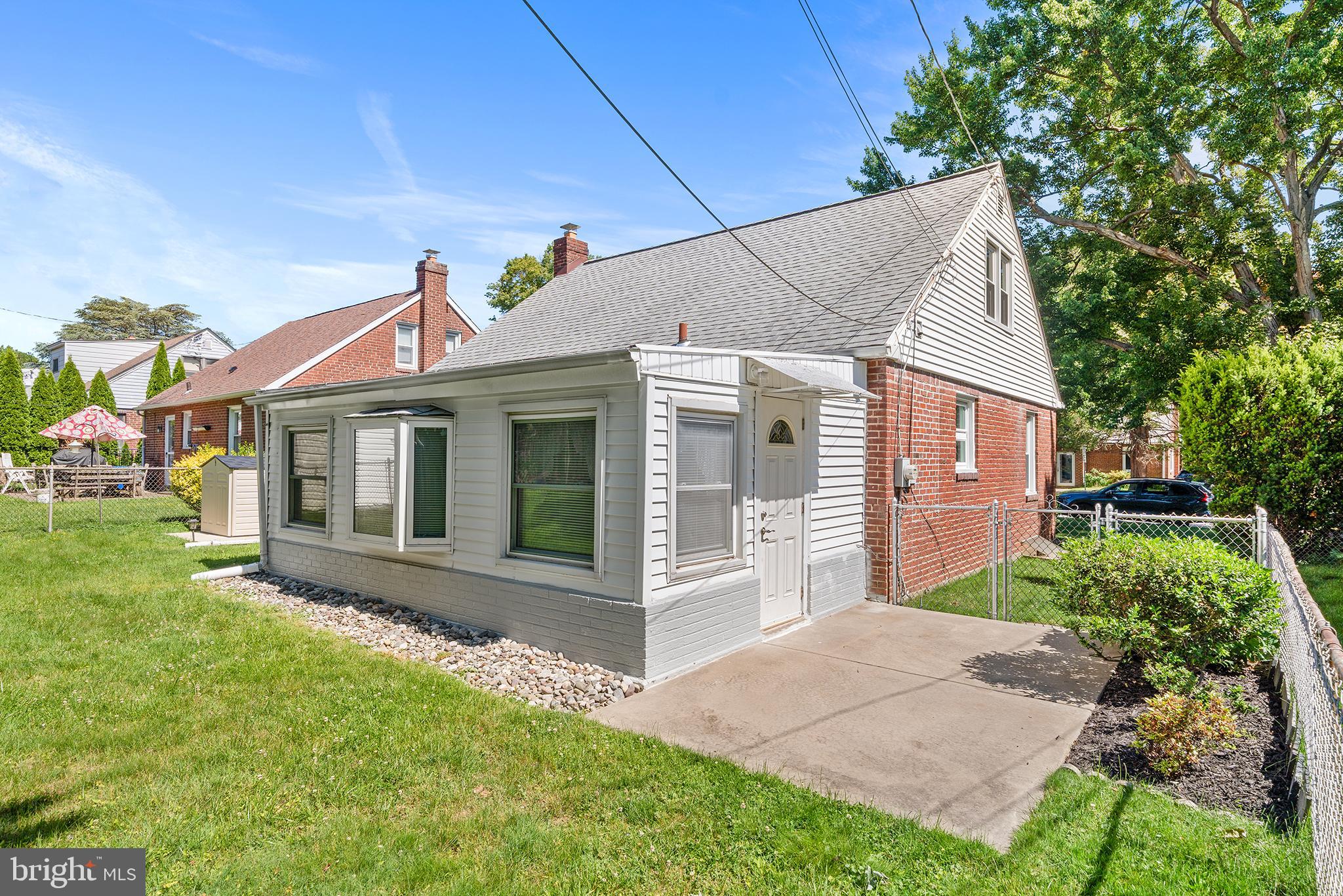 504 Lawrence Road Havertown, PA 19083 - Photo 6 of 20 a front view of a house with a yard