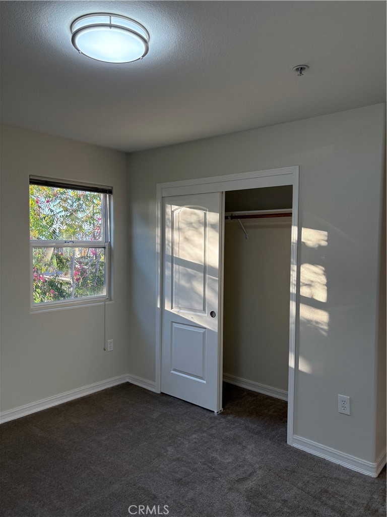 10207 Mountair Avenue, Unit 105 Tujunga, CA 91042 - Photo 28 of 32 an empty room with window