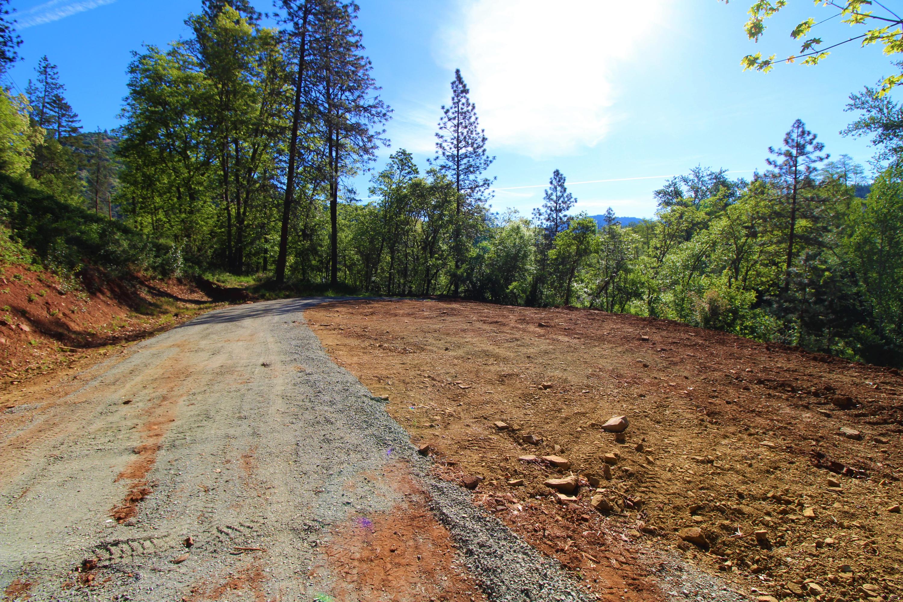 7000 North Applegate Road Grants Pass, OR 97527 - Photo 13 of 17 a view of a backyard of a house
