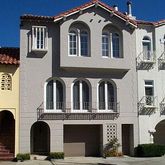 a front view of a house with a garage