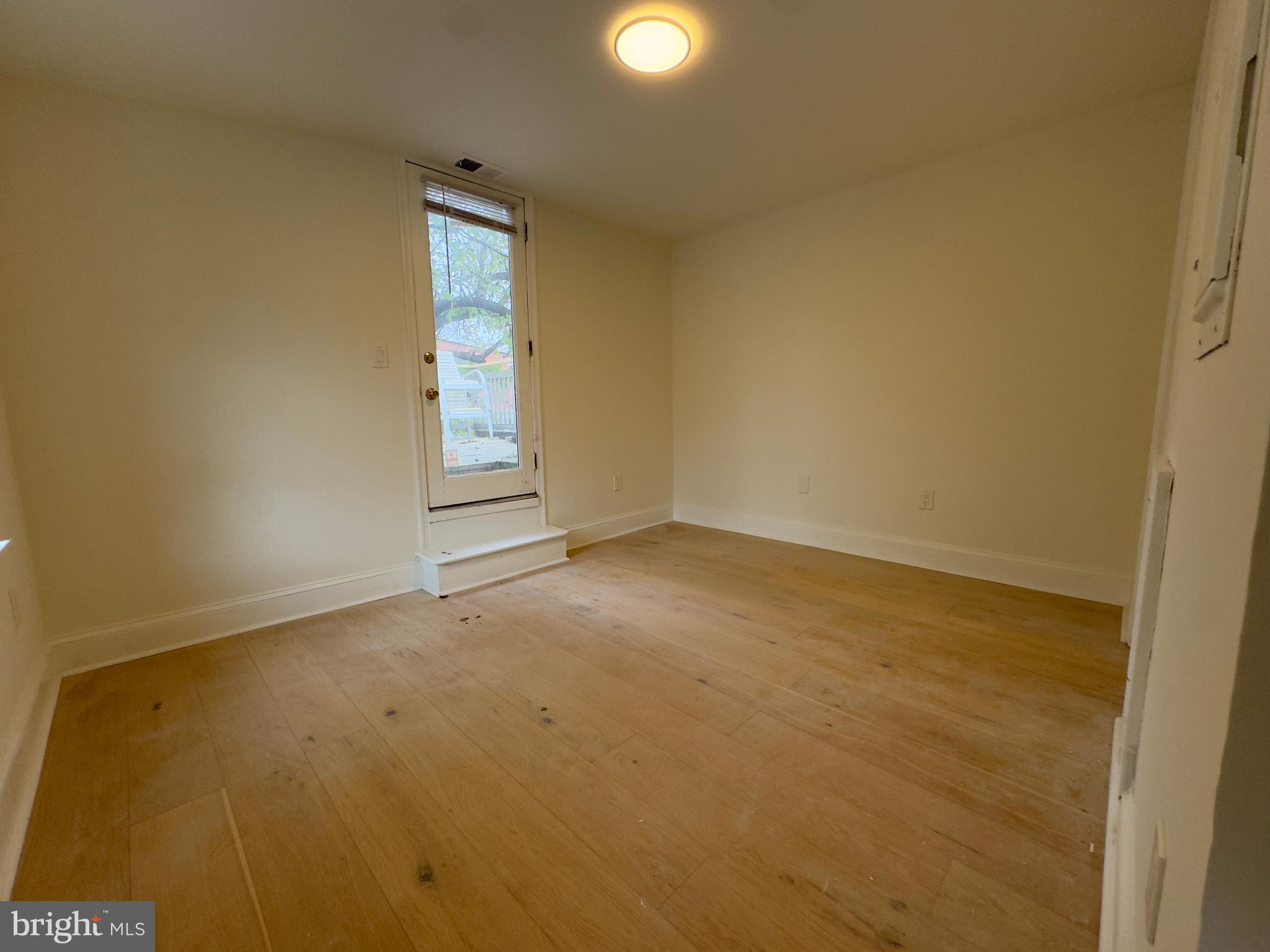 1703 Green Street, Unit 7 Philadelphia, PA 19130 - Photo 10 of 12 an empty room with windows and closet
