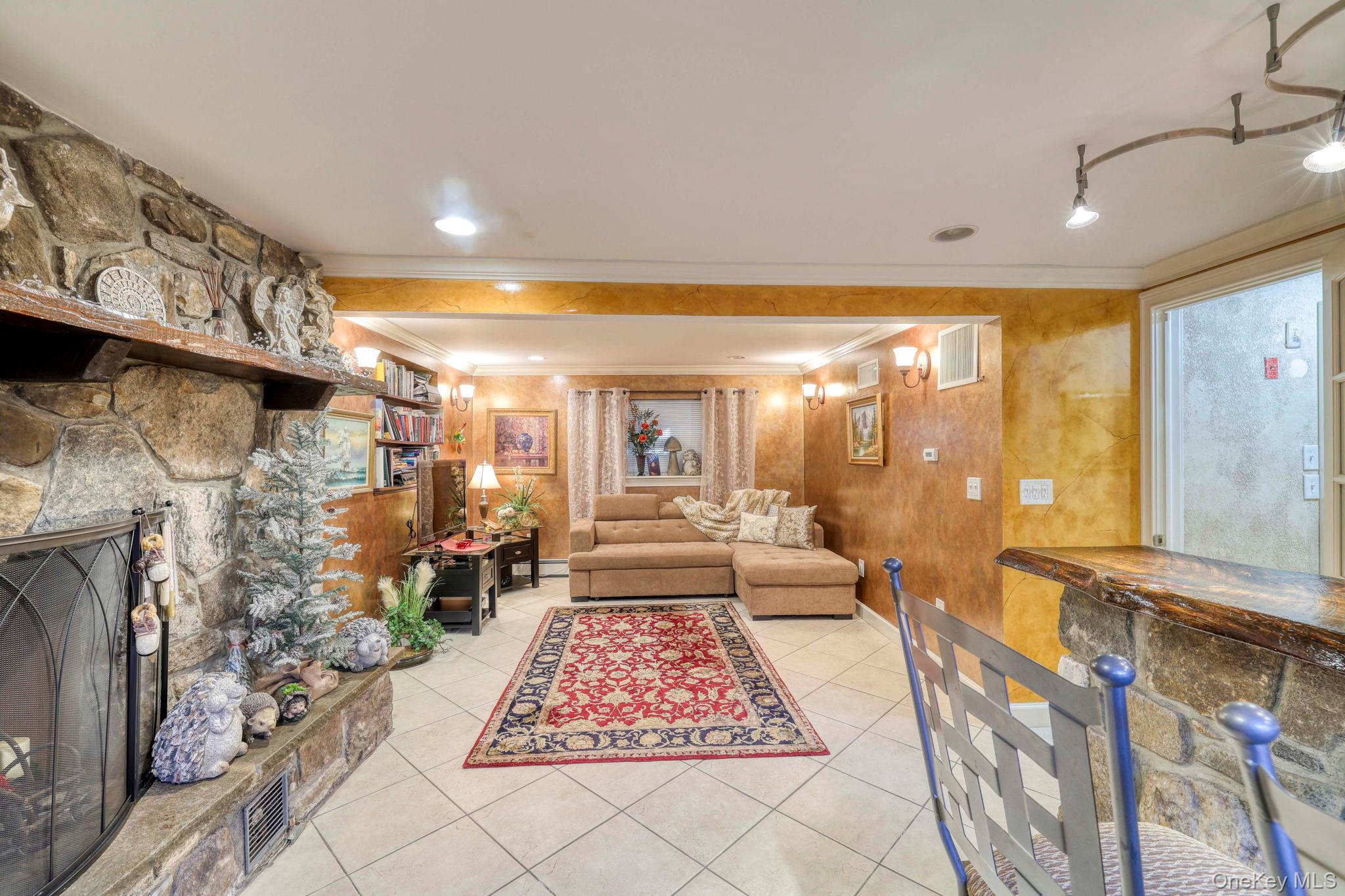 135 Barrett Hill Road Carmel, NY 10512 - Photo 16 of 37 a large room with lots of windows and glass door