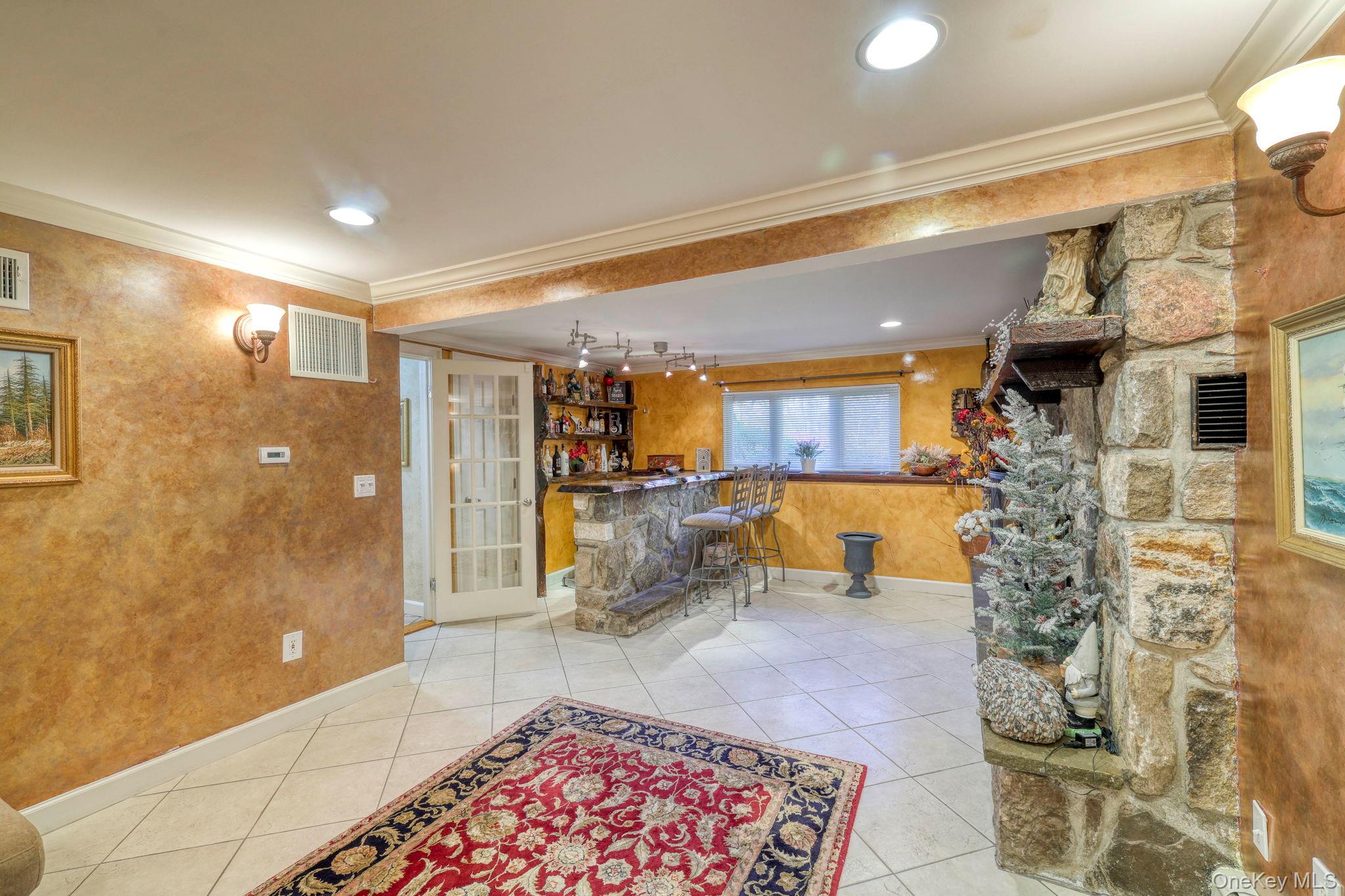 135 Barrett Hill Road Carmel, NY 10512 - Photo 17 of 37 a living room with a rug