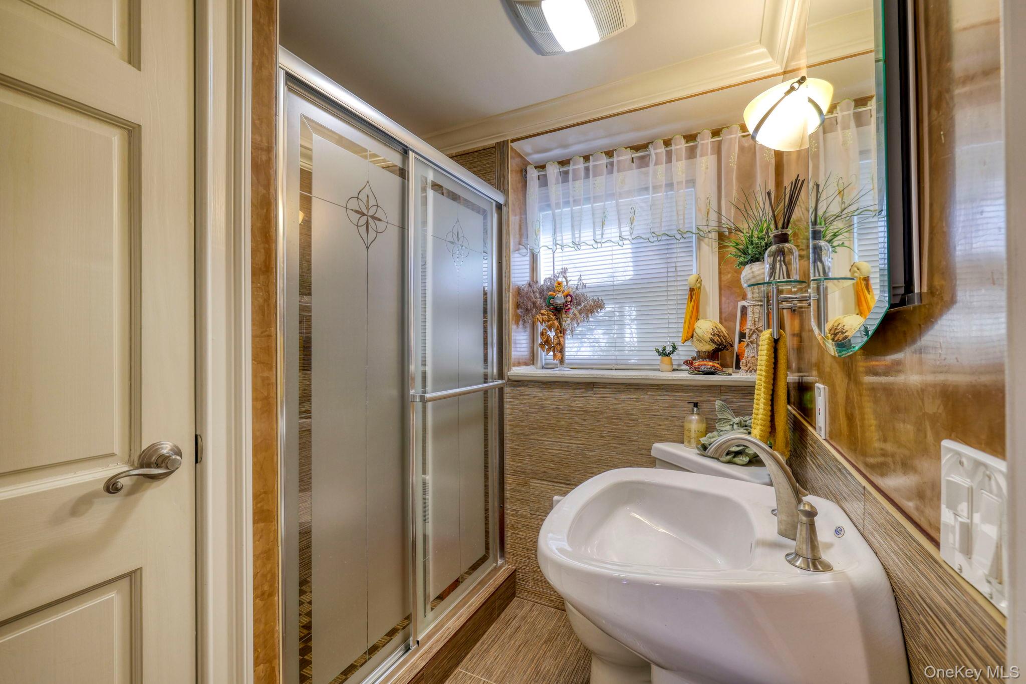 135 Barrett Hill Road Carmel, NY 10512 - Photo 19 of 37 a bathroom with a sink and a mirror