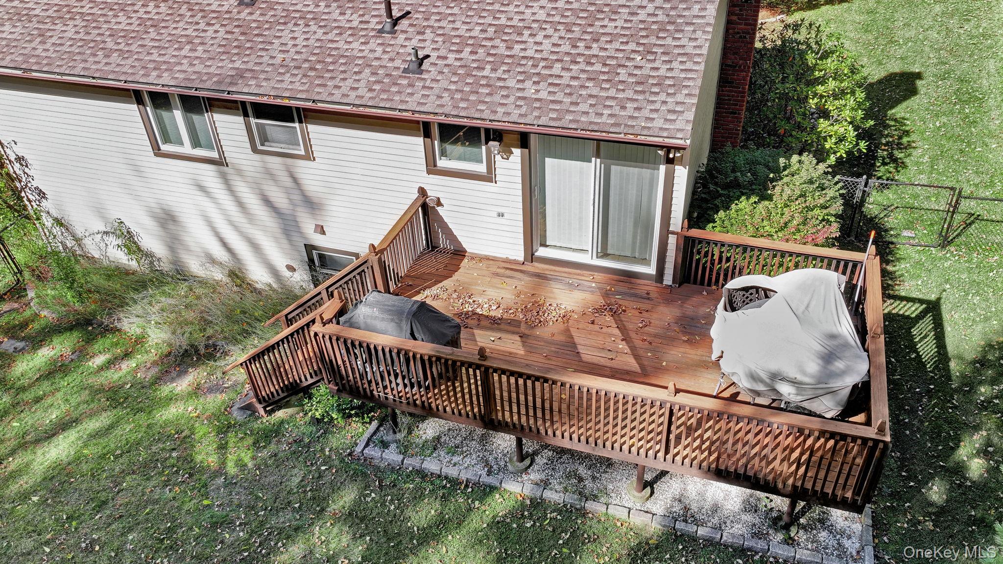 135 Barrett Hill Road Carmel, NY 10512 - Photo 27 of 37 a view of a house with backyard and sitting area