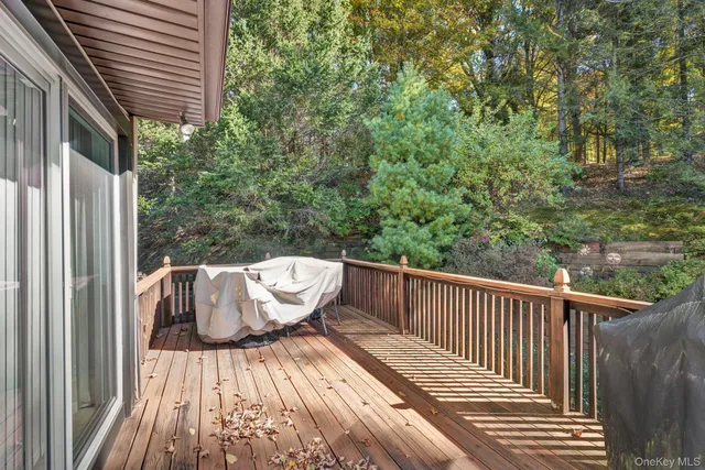 a view of balcony with furniture