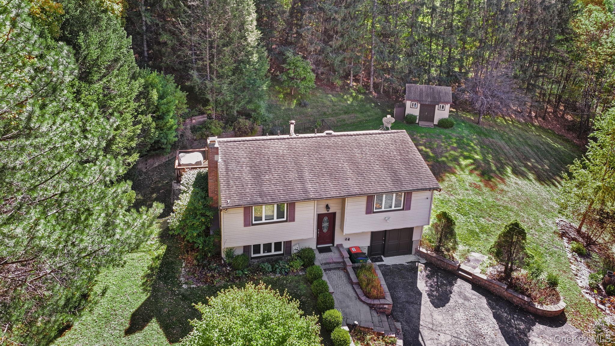 135 Barrett Hill Road Carmel, NY 10512 - Photo 36 of 37 an aerial view of a house with outdoor space and street view