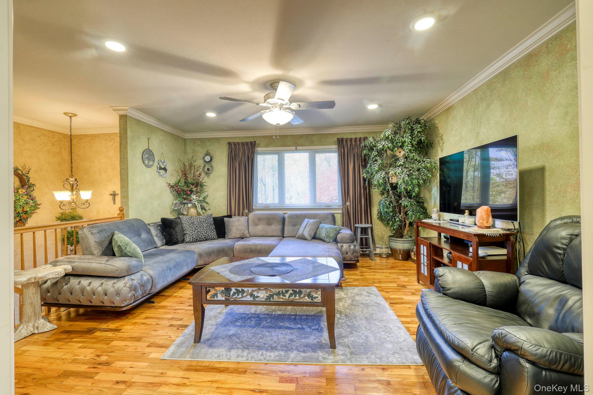 135 Barrett Hill Road Carmel, NY 10512 - Photo 4 of 37 a living room with furniture and a large window