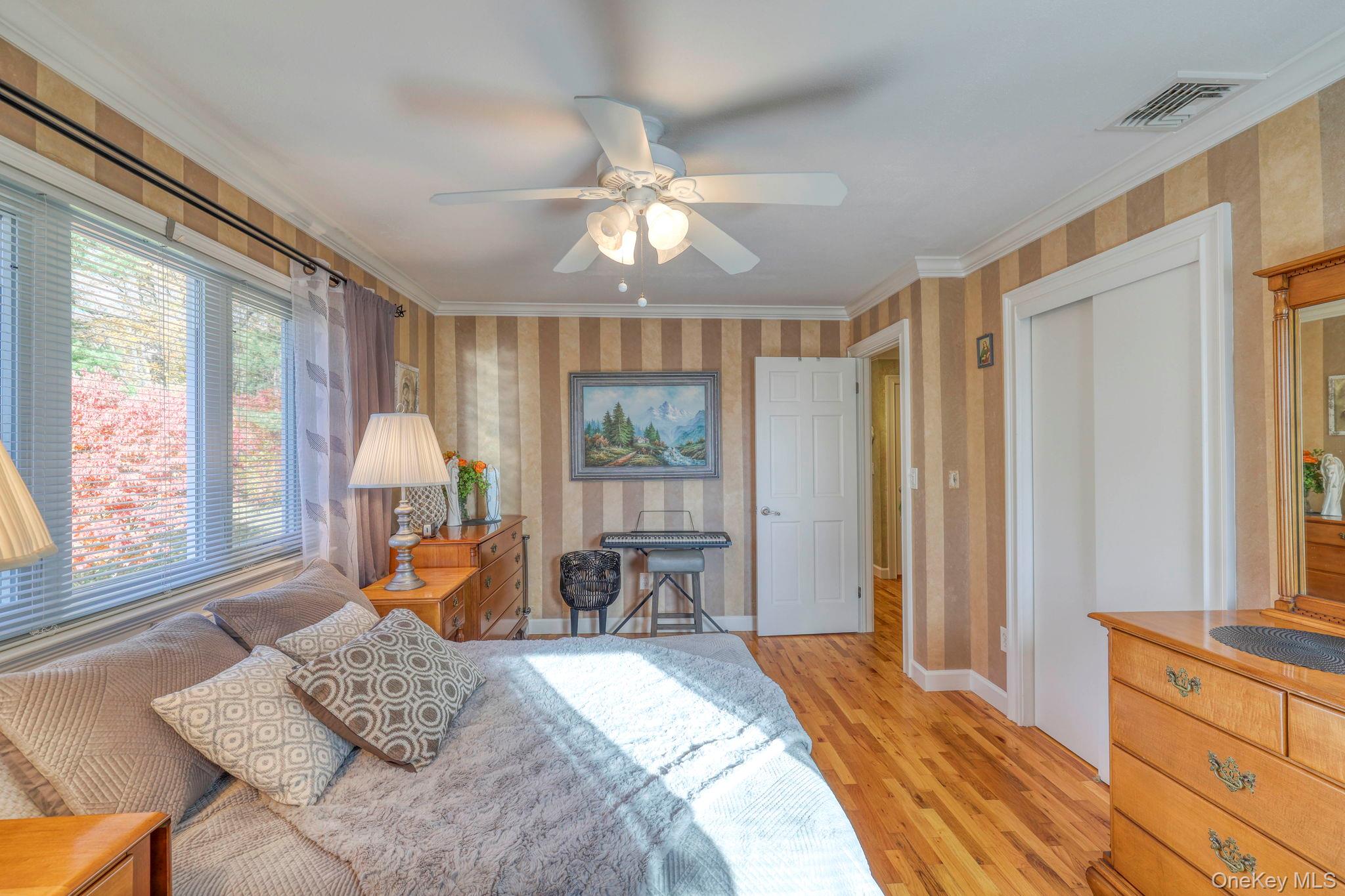 135 Barrett Hill Road Carmel, NY 10512 - Photo 10 of 37 a bed room with a bed and a window