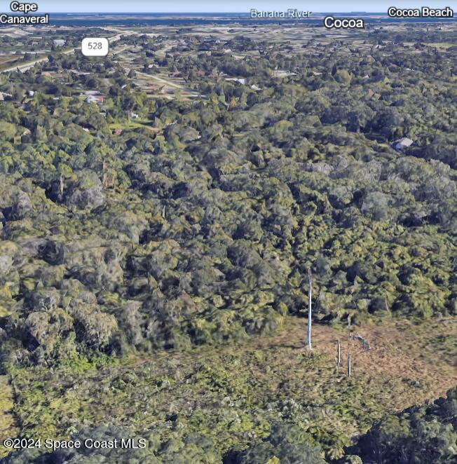 0 James Road Cocoa, FL 32926 - Photo 5 of 7 a view of a field with lots of trees