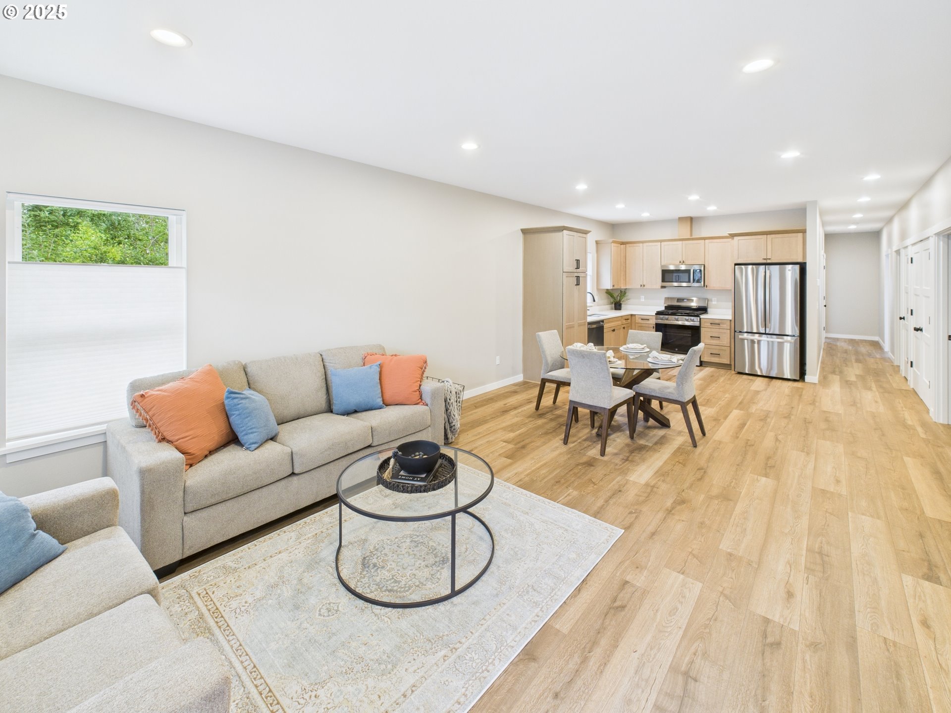 1269 Avenue D Seaside, OR 97138 - Photo 8 of 22 a living room with furniture and a wooden floor