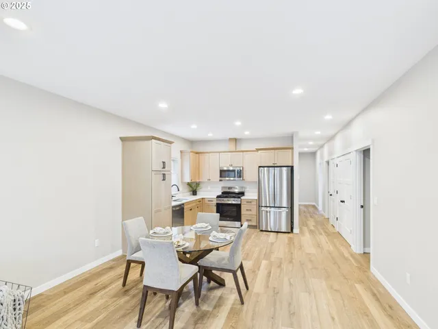 a view of a dining room with furniture
